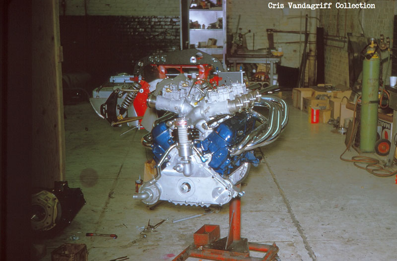 Name:  HSC Mk1 Ford Engine on Stand With Chassis Behind Credit Vandagriff.jpg
Views: 2750
Size:  96.6 KB