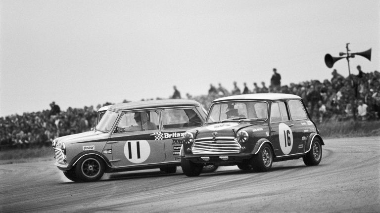 Name:  Mini Cooper racing in the 60s.jpg
Views: 725
Size:  50.4 KB