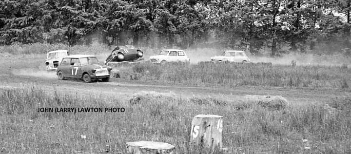 Name:  Motor Racing Kerepehi #024 TVCC 1967 Feb Minis Elf Mini on two wheels #2 close up John Larry Law.jpg
Views: 371
Size:  50.1 KB